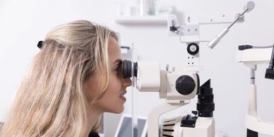 eye doctor performing an eye exam