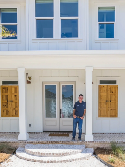 Bryan pictured at the completion of a coastal waterfront home in Perdido Key, Florida