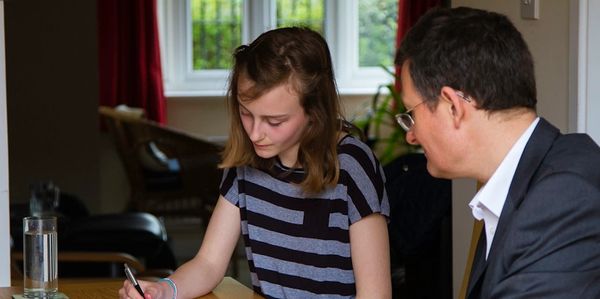 Steve tutoring a pupil