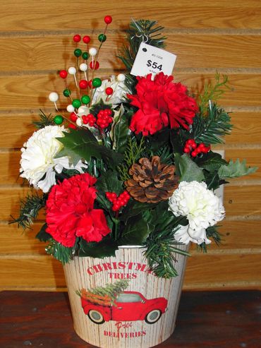 "Christmas Trees" Bucket with Pine, Red, White & Green Berry Spray, Red & White Carnations, Pinecone