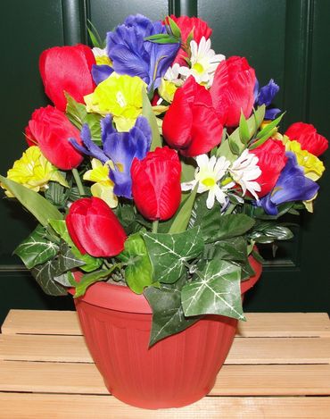 9" Clay Pot with Red Tulips, Yellow Daffodils, Blue Iris, White Daisies & Ivy