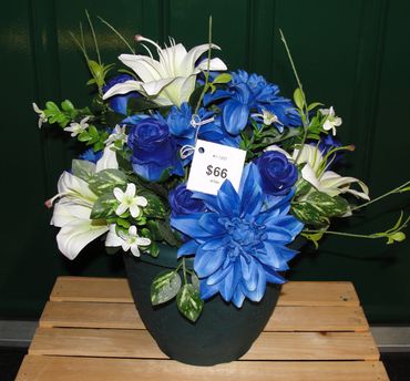 10” Green Pot with Grape Design with Blue Dahlias, Rosebuds & White Lilies 