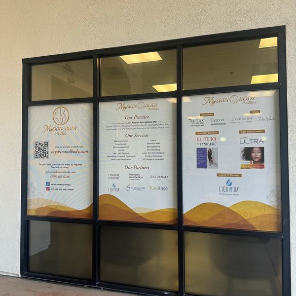 Clinic window display for MySkin Body MedSpa services and partners.