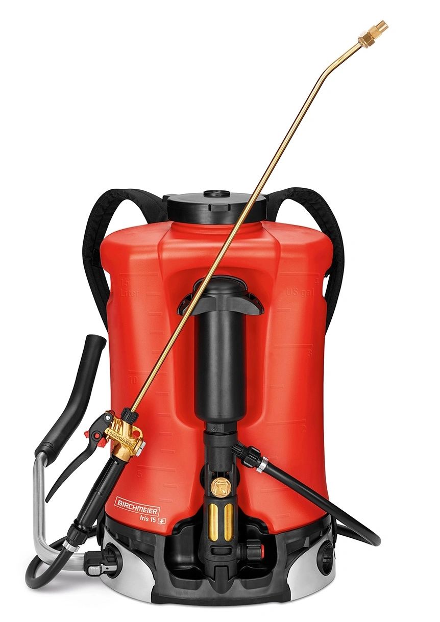 Red and black backpack sprayer with brass nozzle and hose.
