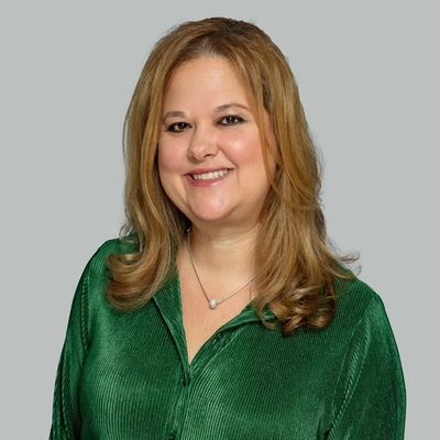 Founder of Shooting Star Products in a professional headshot