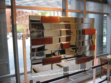 Mirror Polished Stainless Steel Sculpture with Claro Walnut
