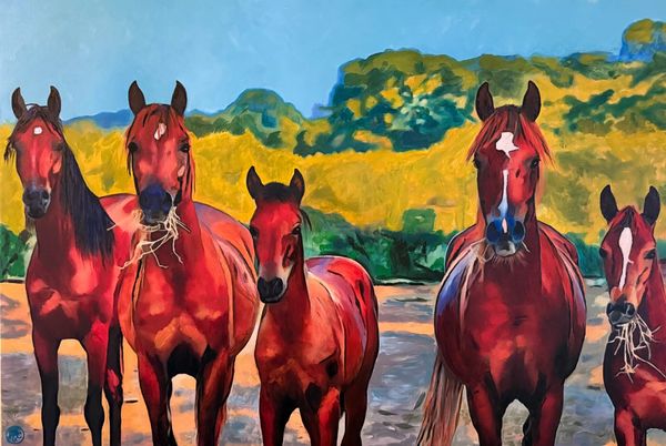 Five red horses standing together in a vibrant outdoor scene.