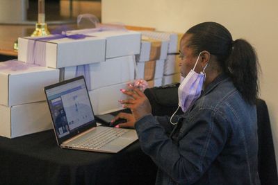 Our founder, Kama, working on her computer before the 6th Annual 'I Matter' Conference for Girls. 