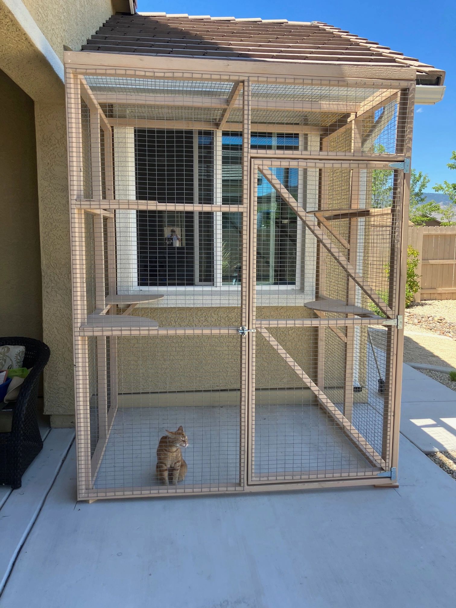 A DECK PATIO CATIO WITH WINDOW ACCESS.  