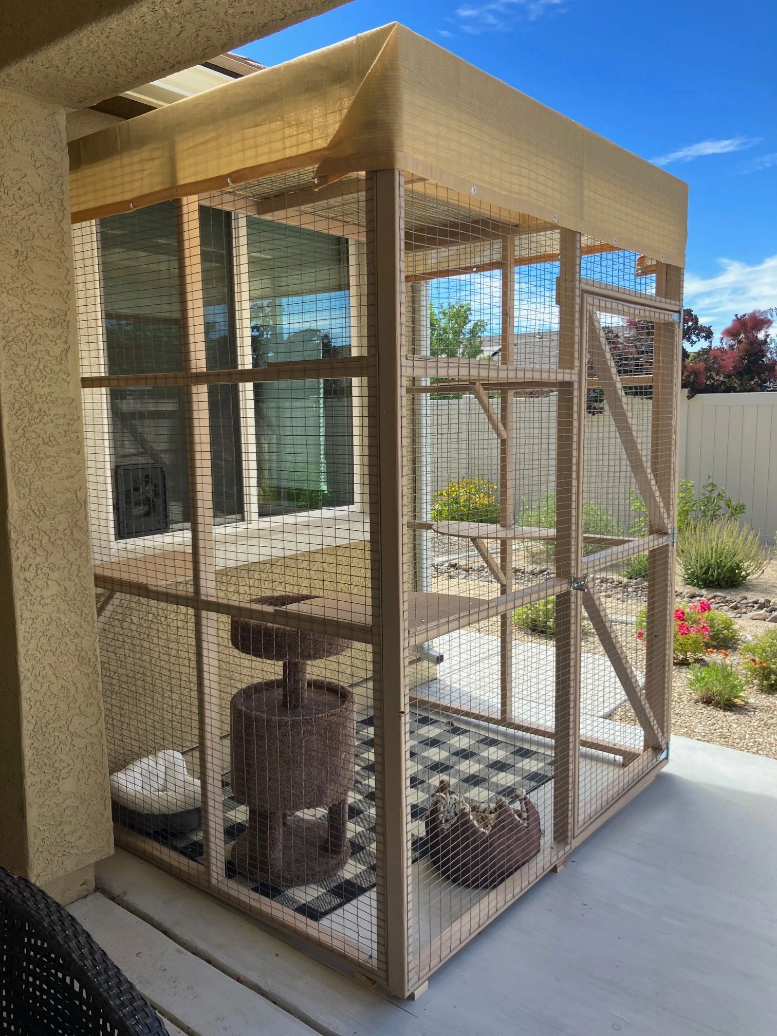 A PATIO CATIO WITH WINDOW ACCESS.  ALL THE BELLS AND WHISTLES ADDED.