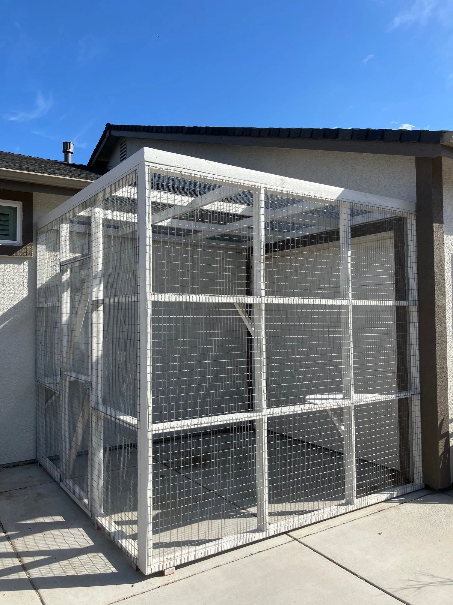 GARAGE DOOR CATIO.  THE CUSTOMER CAN RAISE AND LOWER THE GARAGE DOOR TO ANY HEIGHT.