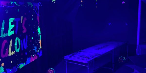 Glow party, black uv lights, lets glow banner, beer pong table, glow party accesssories