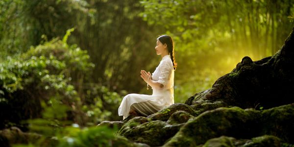 Photo by shu lei: https://www.pexels.com/photo/woman-in-white-dress-sitting-on-rock-13865957/