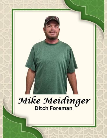 Portrait of Mike Meidlinger, Ditch Foreman, in green shirt and cap.