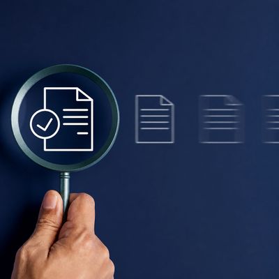 Magnifying glass examining a verified document, illustrating content review, fact-checking, quality 