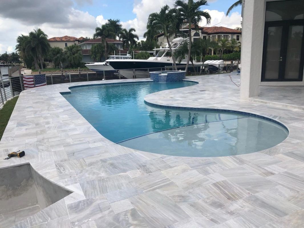 Decorative Concrete The Many Faces For Your Driveway Patio Or Pool Deck Euro Tile Spray Deck Epoxy Coatings Which One To Choose Is The Question