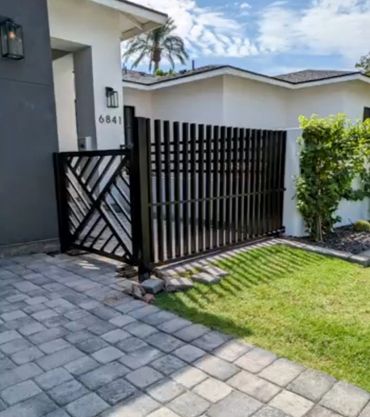 Modern floating picket wrought iron fence with a durable black powder-coated finish. Phoenix, Arizon
