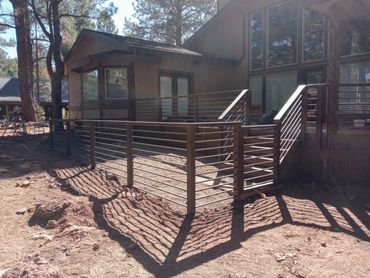 Custom dog run with matching deck railing. Flagstaff, Arizona.