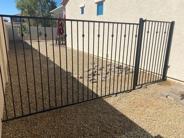 Side yard enclosure with matching gate and decorative accents. Peoria, Arizona. 