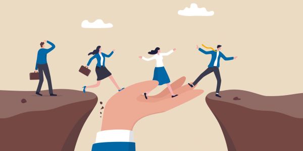 People crossing a gap with the help of a giant hand as support.