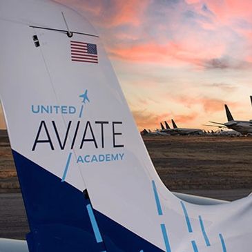 Tail of a United Aviate Academy aircraft at sunset.