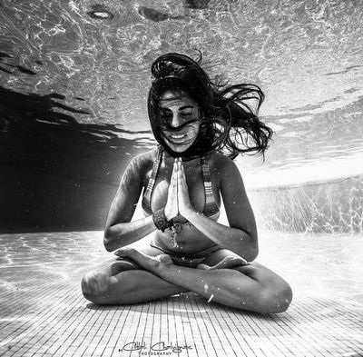 Woman performing Vinyasa Flow and Meditation