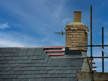 Pitched slate roof repair and chimney stack repointing