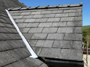 Slate roof with new lead valley