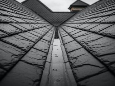 reclaimed slate roof with lead gulley