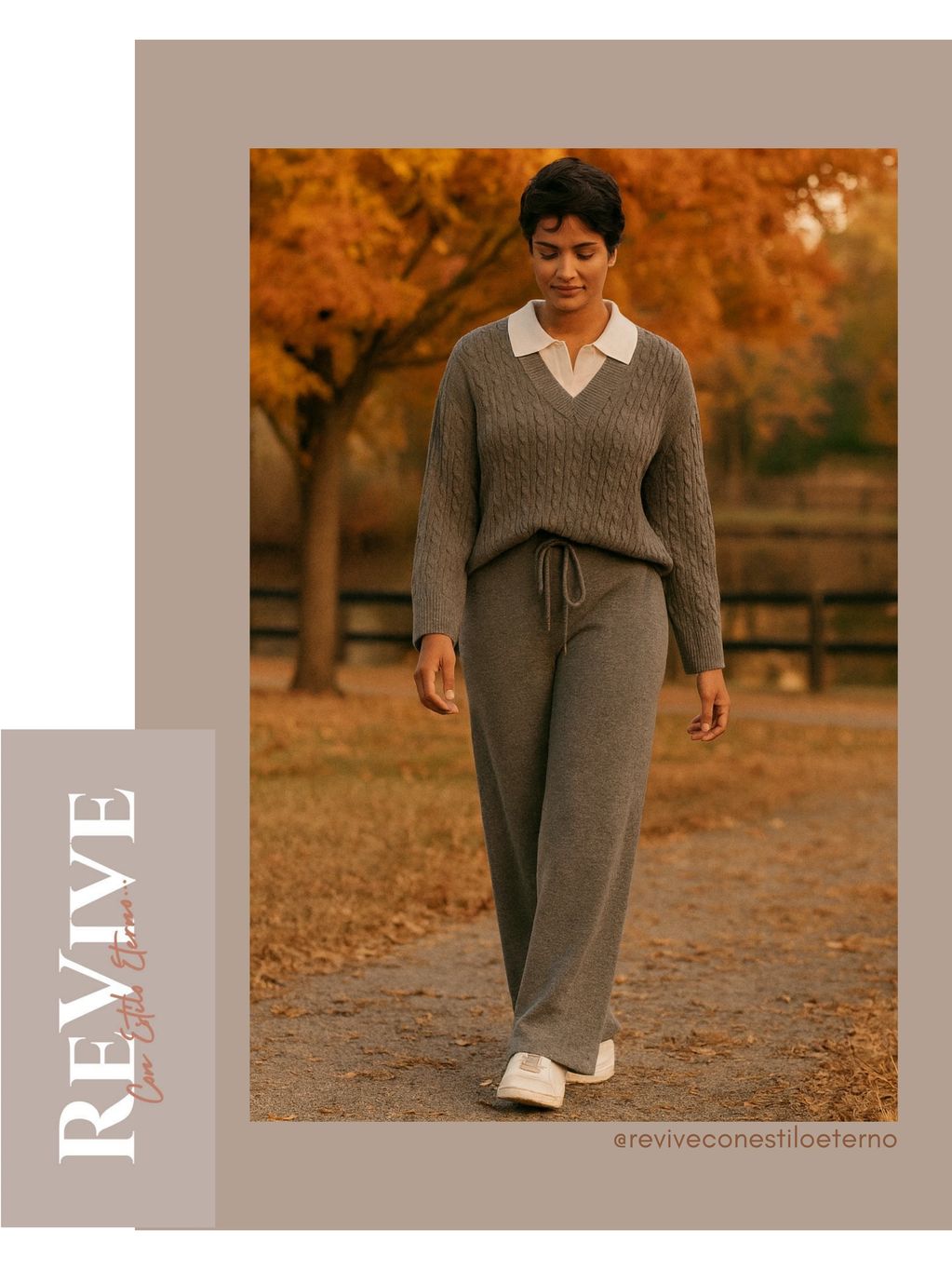 Mujer caminando en un parque otoñal, vistiendo suéter gris con cuello blanco y pantalón gris suelto.