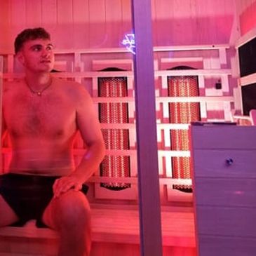 A person using the infrared sauna at Rejuve Recovery in Scarborough 