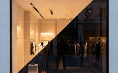 Conceptual privacy window film showing tinted glass on a modern storefront