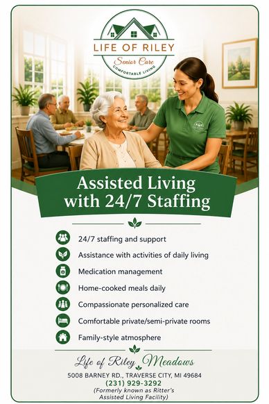 Elderly being assisted at Life of Riley Care Traverse City, MI and explanation of Meadows services. 