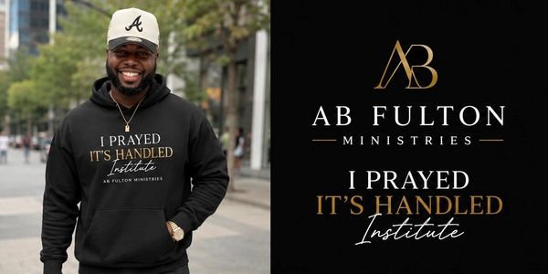 Man wearing a hoodie with 'I Prayed It's Handled Institute' text from AB Fulton Ministries.