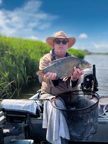 Allan from Fishing in Norfolk angling guides with an early season Norfolk Bream