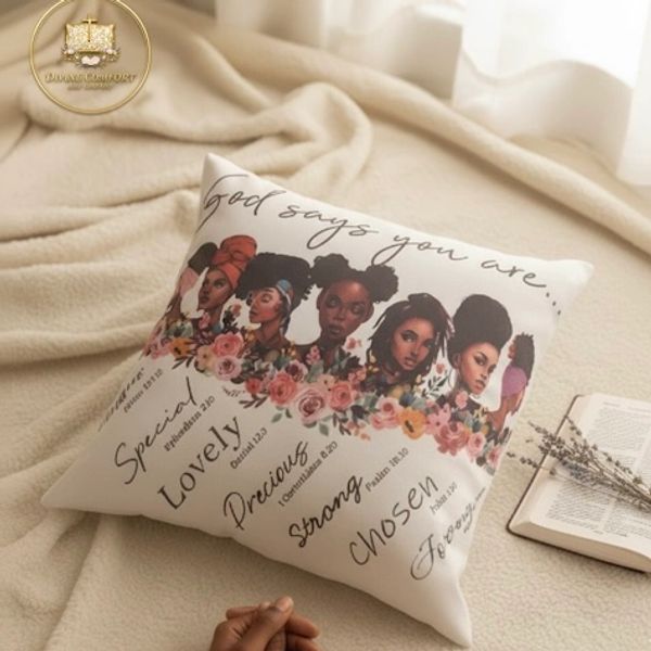 Decorative pillow with empowering words and illustrations of diverse women.