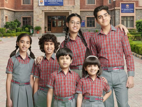 school students flaunting their uniforms