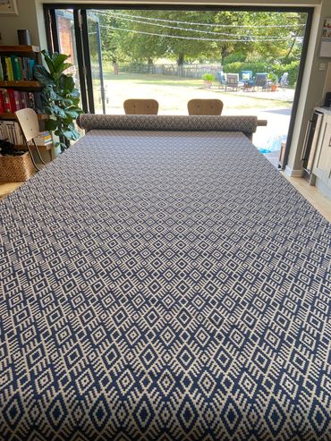 Blue Aztec fabric roll ready for curtain making