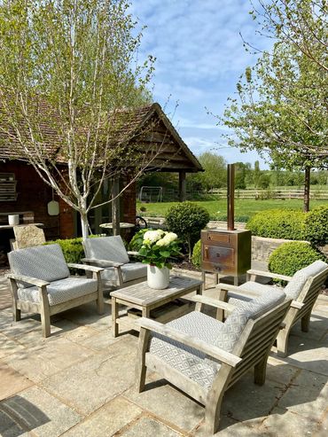 Outdoor patterned grey and white box cushions