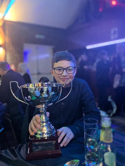 Frank winning his first trophy 