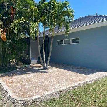 Custom paver patio and walkway design in Melbourne, FL backyard