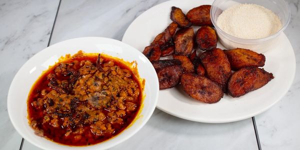 Red Red: Beans and red palm-oil with fried plantain and crunchy gari