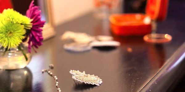 Bridal jewelry in front of mirror