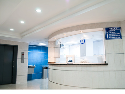 Reception area in a modern medical facility with a clean design.