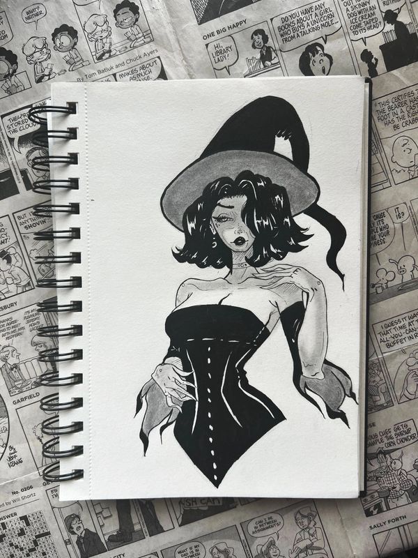 A women dressed as a sexy witch