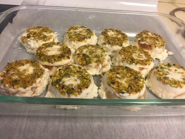 Aish Al-Saraya Ashta Milk Pudding cups topped with Pistachios