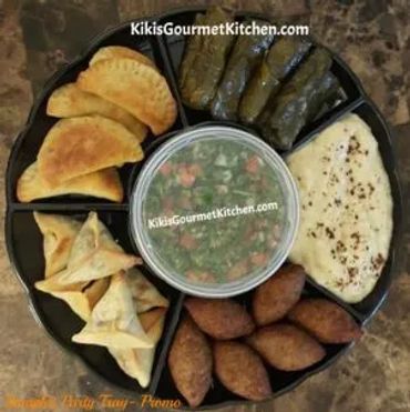 Kikis Gourmet Party Platter: Kibbeh, Spinach Pies, Sambousik, Grape Leaves, Baba Ghanoush, Tabbouleha