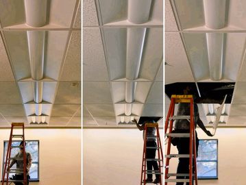 Energy-efficient LED lighting installed in a commercial ceiling for improved illumination