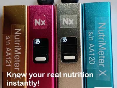 Four colorful NutriMeter devices with digital displays for instant nutrition info.