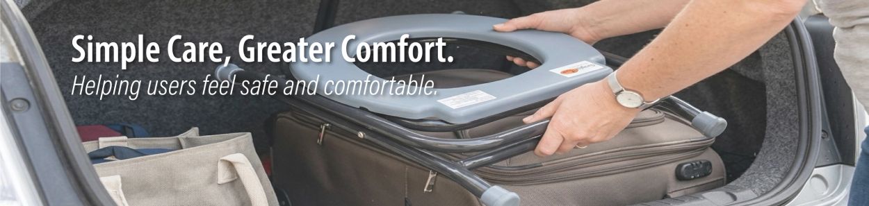 Person placing a foldable chair in a car trunk with a care message.